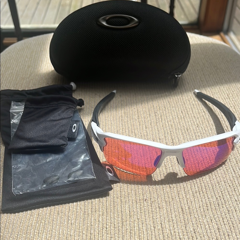 Oakley White Frame Sunglasses with Red Lenses